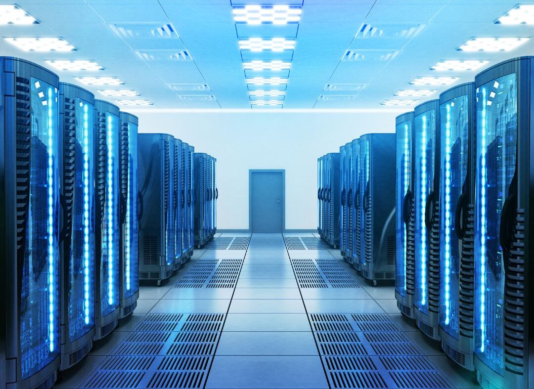 Modern data center corridor with server racks and high-density equipment.
