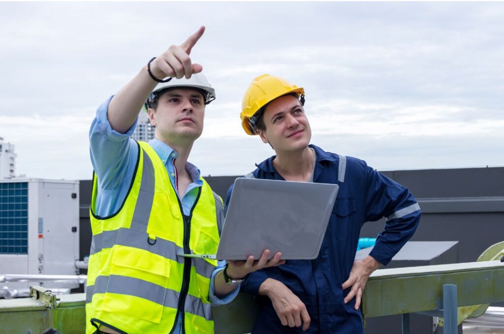 Mission-critical construction team reviewing data center build plans.